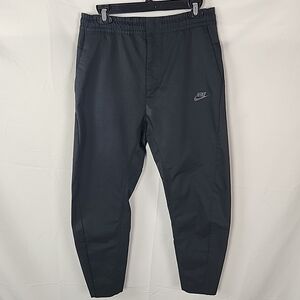 Nike Sportswear Tech Woven Pants Mens Size Medium Black Tapered Commuter AR3221